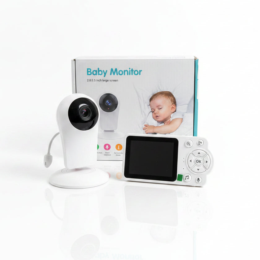 Originalno belo pakovanje Baby Monitor uređaja sa slikom bebe koja spava, prikazom kamere i ikonama za detekciju temperature i plača.